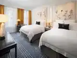 Четырёхместный номер Grand Deluxe Tub Top Floor