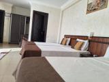 Четырёхместный номер Deluxe с видом на город