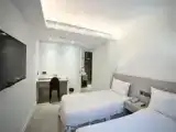 Трёхместный номер Deluxe