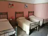 Трёхместный номер Стандарт с балконом и с видом на внутренний двор