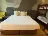 Четырёхместный номер Deluxe семейный с балконом и с видом на бассейн