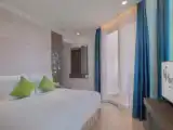 Четырёхместный семейный номер Deluxe с видом на море