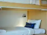 Кровать в общем номере