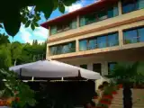 Стандартный двухместный номер с 2 отдельными кроватями и видом на сад