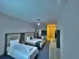 Трёхместный номер Deluxe