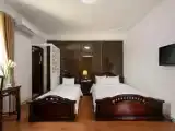 Трёхместный номер Deluxe с балконом и с видом на город