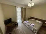 Четырёхместный номер Стандарт с 2 комнатами