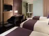 Трёхместный номер угловой Deluxe