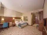 Трёхместный номер Deluxe
