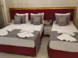Трёхместный номер Deluxe с видом на море