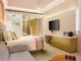 Четырёхместный люкс семейный Deluxe с видом на поле для гольфа и океан