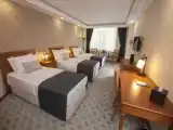 Трёхместный номер Deluxe