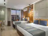 Трёхместный номер Deluxe с видом на сад