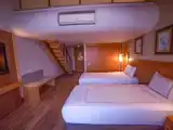 Четырёхместный номер Family Дуплекс с видом на окрестности