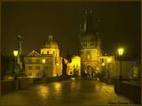 Night in the Czech Republic. The Magic Prague - Charles Bridge and Old Town Bridge Tower with church of St. Francis of Assisi (UNESCO)