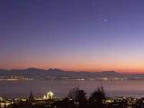 Lake Geneva and Cathedral in the dusk with two stars (Lausanne)