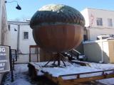 Raleigh's acorn sculpture sits on its trailer in the snow, awaiting its big event: being dropped in City Plaza at midnight on New Year's Eve, 12-28-10