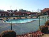 the chainlink-protected swimming pool at the Milner Inn sparkles in the morning sunlight, 1-16-11