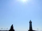 Harbor entrance with sun Harbor entrance with sun