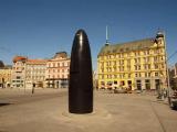 Brno - hodiny na nám. Svobody. Clock in the shape of cartridge case on Freedom Square Brno - hodiny na nám. Svobody. Clock in the shape of cartridge case on Freedom Square