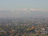 Looking Southwest from the Rimrocks in Billings, MT, the Beartooth Mountains (zoomed in because they are 70 miles away) are in the background.  Yellowstone Park is behind the Beartooth Mountains