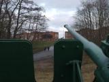 At gunpoint