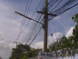 แนวพาดสายเคเบิลบริเวณถนนพิทักษ์พนมเขตก่อนเข้าsite : ธ.เกียรตินาคินสาขามุกดาหาร
