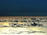 clouds from Teide. Sun reflected from below (from sea)