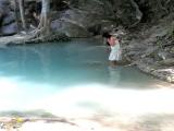 Thai women walk in the water. Thai women walk in the water.