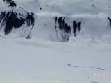 Cross-country Skiers Dwarfed By Rock & Ice