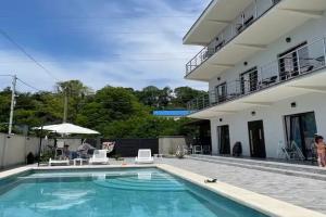 Гостевой дом «SunMania», Лоо