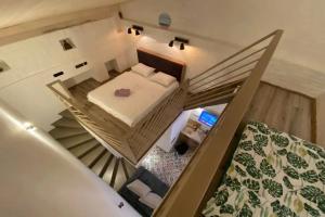 Уютные трехуровневые апартаменты в стиле Лофт в центре города Уровни