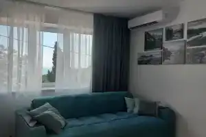 Современные апартаменты в гостевом доме с видом на море