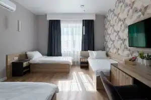 Трёхместный номер комфорт с 3 отдельными кроватями