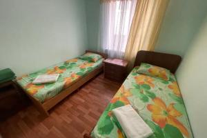 Двухместный номер с 2 отдельными кроватями эконом с видом на город, Лоо