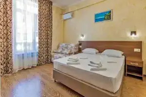 Семейный номер с балконом с прямым видом на море, Лоо