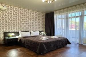 Двухместный номер с 1 кроватью Deluxe с террасой с видом на город с доп местом (1 этаж), Геленджик