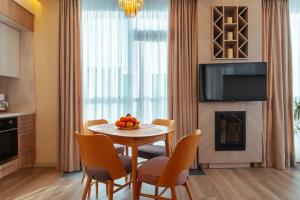 Охта Парк Люкс Resort с сауной и камином с одной или двумя спальнями