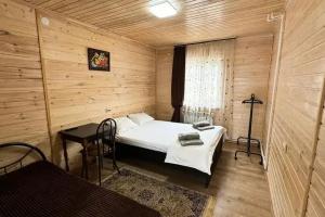 Трёхместный номер с двуспальной и односпальной кроватью, Архыз
