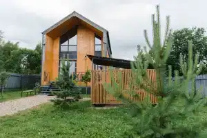 Коттедж с сауной для семейного отдыха в стиле барнхаус