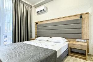 Корпус №2 - Семейный Люкс с боковым видом на море