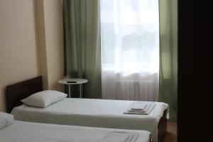 Двухместный номер с 2 отдельными кроватями стандартный