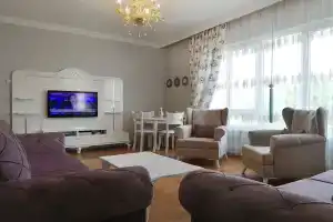 4-х к. кв. 140 м2 на пляже Клеопатры с элитным видом на горы, Аланья
