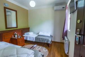 Двухместный Делюкс с 1 кроватью или 2 отдельными кроватями и балконом