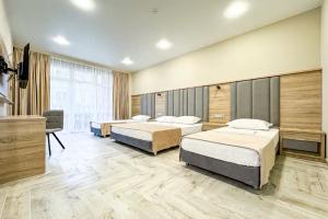 Делюкс 4-местный с балконом