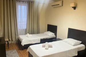 Двухместный номер с 2 отдельными кроватями Стандарт