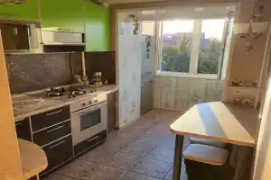 Уютная квартира в самом сердце города с видом на часы с осликом