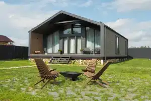 Современный дом с баней у водохранилища