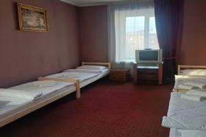 Четырёхместный номер Стандартный с 4 отдельными кроватями