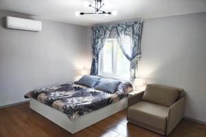 Трёхместный номер - студия полулюкс с кухней